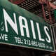 A sign for a nail salon is seen on May 11, 2015, in the East Village neighborhood of Manhattan in New York City. New York Gov. Andrew Cuomo announced emergency measures to protect nail salon workers after an investigative report by the New York Times revealed many workers are exploited and underpaid.
Andrew Burton/Getty Images